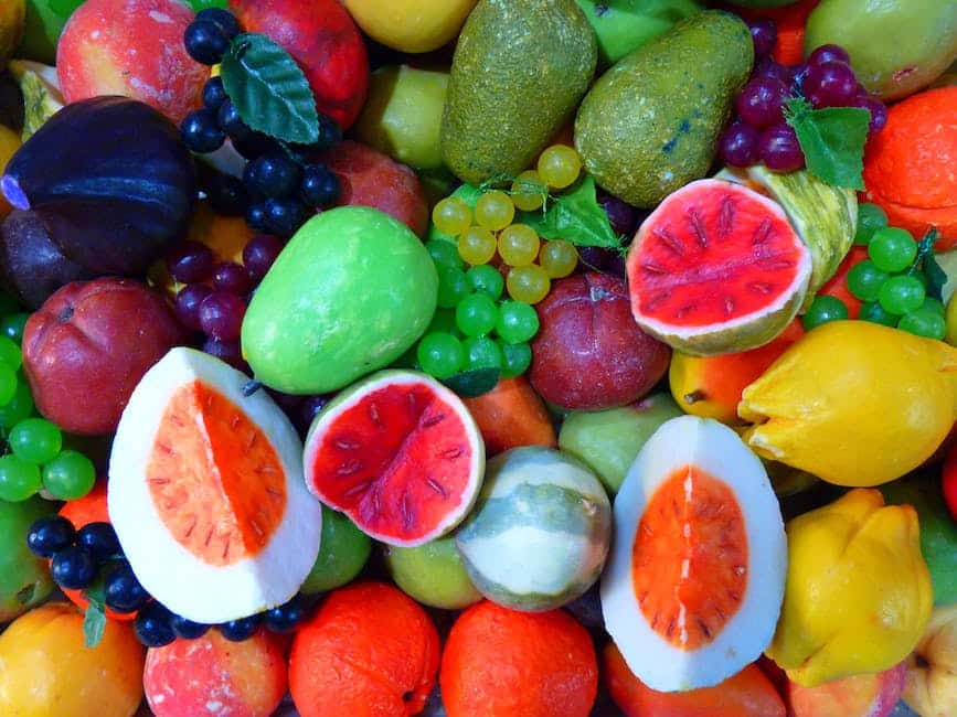 Image of a plate containing a variety of colorful fruits and vegetables, symbolizing the importance of balanced nutrition for healthy aging.